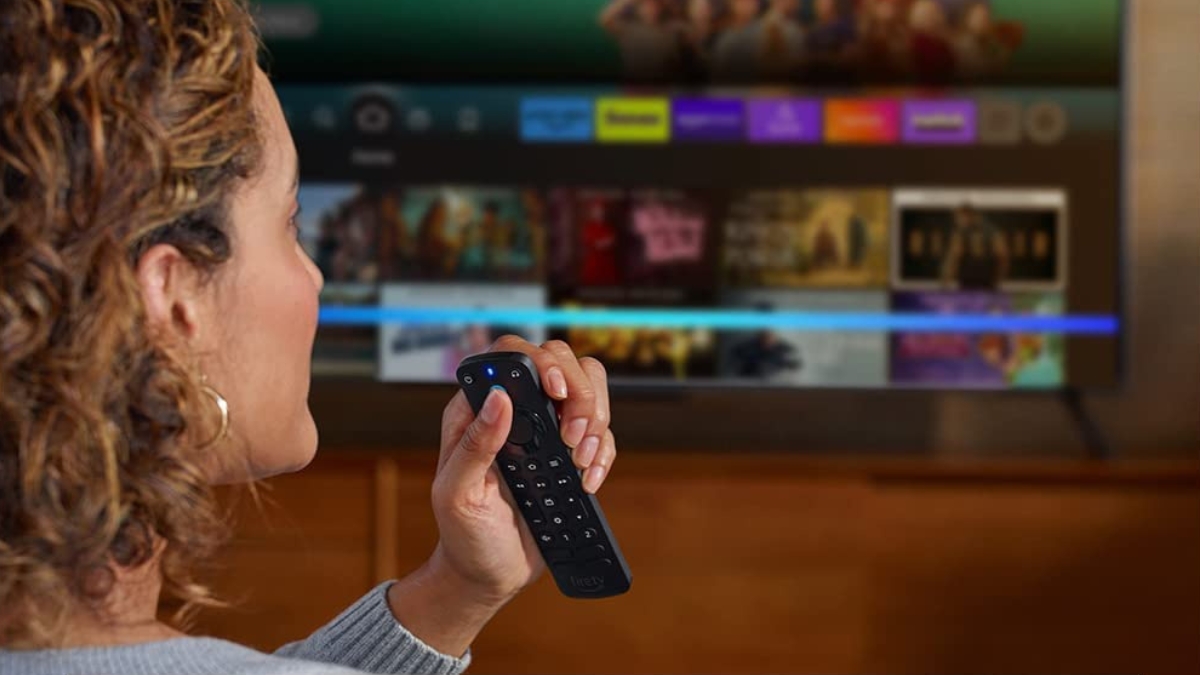 Women Holding Fire TV Remote